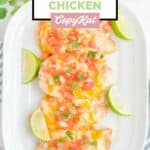 Overhead view of homemade Applebee's fiesta lime chicken and lime wedges on a platter.