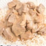 homemade beef stroganoff over rice on a plate.