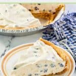slice of no bake blueberry cream pie on a plate.