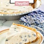 No bake blueberry cream pie and a slice on a plate.