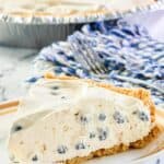 blueberry cream pie with fresh blueberries.