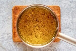 melted butter and ranch dressing mix in a pan.