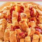 a loaf of cheddar bacon ranch cheesy pull apart bread.