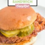 Homemade Chick Fil A spicy chicken sandwich on a white plate.