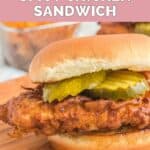 Homemade Chick Fil A spicy chicken sandwich on a wood board.