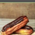 two homemade chocolate topped eclairs.