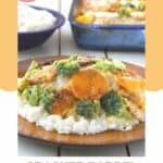 copycat Cracker Barrel broccoli cheddar chicken over rice on a plate.