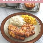 a plate with copycat cracker barrel sunday chicken, corn, and potatoes.
