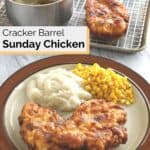 homemade cracker barrel sunday homestyle chicken, corn, and potatoes on a plate.