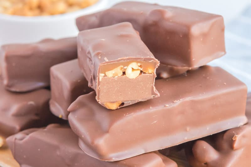homemade snickers bars and one cut in half.