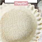 homemade Martha Stewart pie crust in a pie plate before baking.