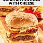 homemade McDonald's smoky BLT quarter pounder with cheese burger on a wood board.