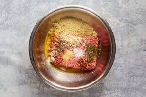 Meatball ingredients in a mixing bowl.