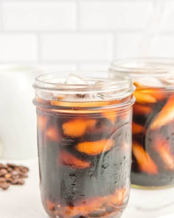 copycat Starbucks cold brew coffee with ice in a mason jar.