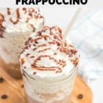 homemade Starbucks mocha frappuccino on a wood board.