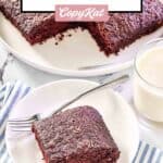 whacky chocolate cake slice on a plate and the cake on a platter.