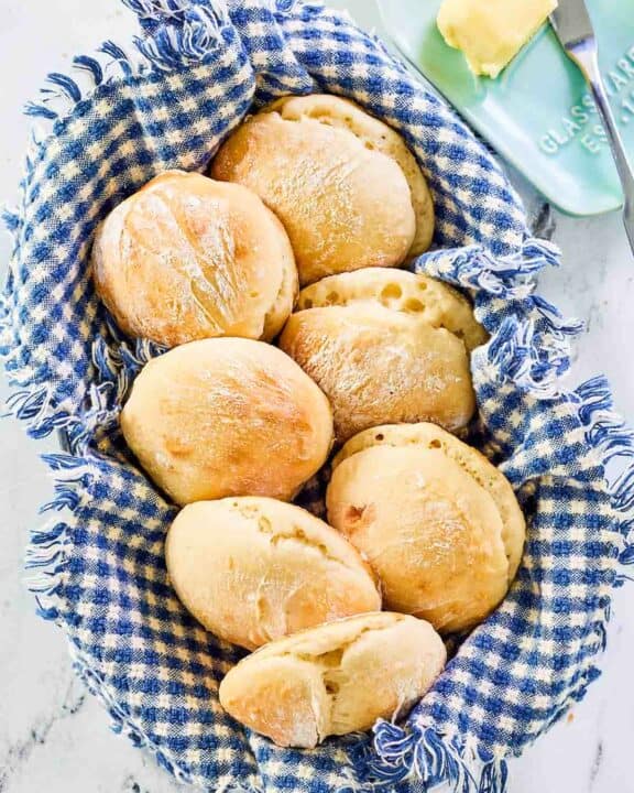 Overhead view of angel biscuits in a basket.