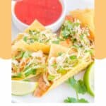Homemade Applebee's chicken wonton tacos and a bowl of sweet chili sauce.