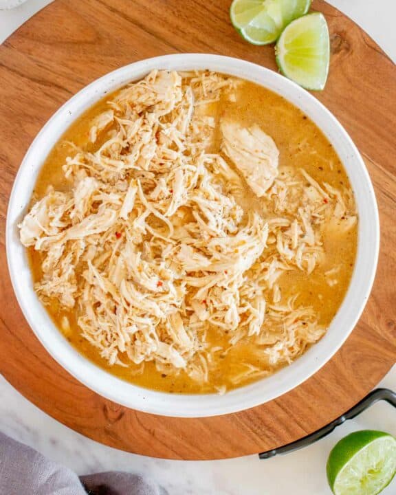Overhead view of copycat Cafe Rio shredded chicken in a bowl.