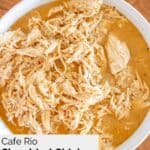 Closeup overview of homemade Cafe Rio shredded chicken in a bowl.