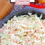 Overhead view of homemade Captain D's coleslaw in a black bowl.