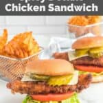Two homemade Chick Fil A spicy deluxe chicken sandwiches and waffle fries.