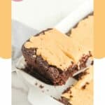 Slice of chocolate caramel cake on a cake server.