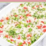 Cilantro rice in a baking dish.