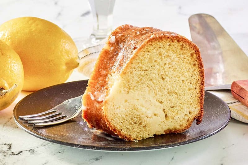 Cream cheese coffee cake slice on a plate.