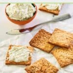 Homemade crackers and a bowl of cheese spread.