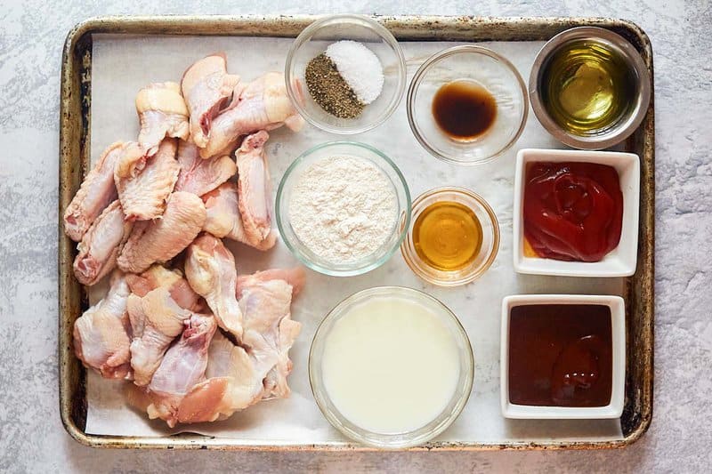 Copycat KFC honey bbq wings ingredients on a tray.