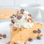 A slice of copycat O'Charley's caramel pie on a plate.