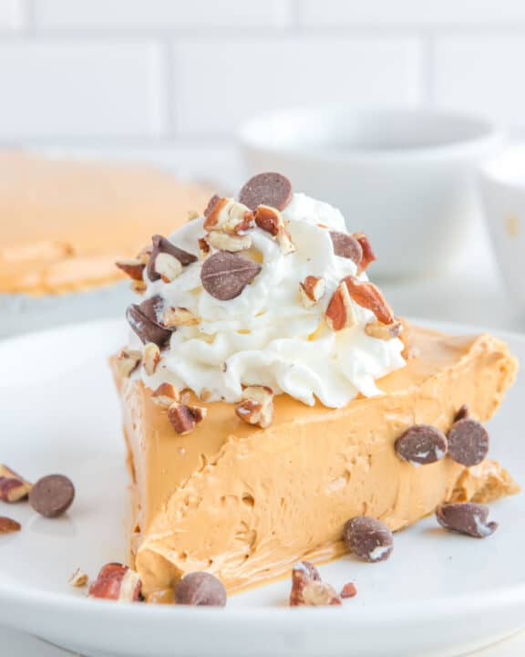 A slice of copycat O'Charley's caramel pie on a plate.