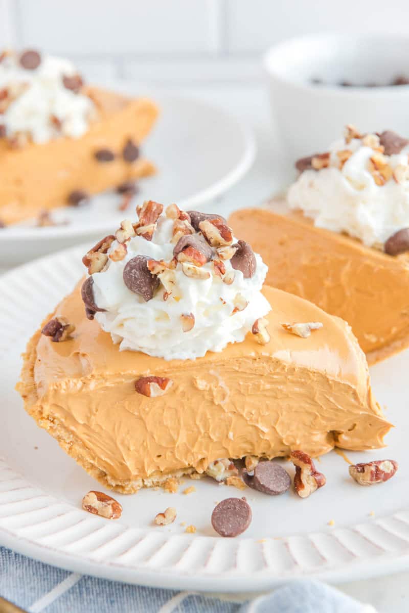 Copycat O'Charley's caramel pie slices on plates.