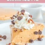 Homemade O'Charley's caramel pie slice topped with whipped cream, chocolate chips, and pecans.