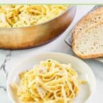 One pot chicken alfredo pasta and bread slices.