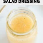 Homemade Panera fuji apple salad dressing in a glass mason jar.