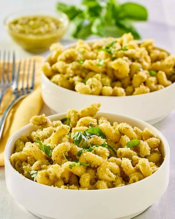 Two bowls of copycat Alonti pecan pesto pasta.