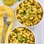 Overhead view of two bowls of homemade Alonti pecan pesto pasta.