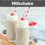 Homemade Chick Fil A cookies and cream milkshake on a wood board.