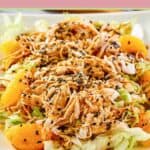 Closeup of Chinese chicken salad with mandarin oranges.