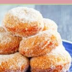 Homemade Chinese sugar donuts on a blue plate.