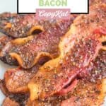 Homemade Dunkin Donuts snackin bacon on a white plate.