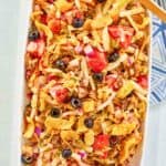 Overhead view of frito taco salad on a platter.