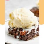 Hot fudge cake and ice cream on a plate.