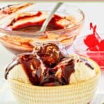 A bowl of ice cream topped with homemade hot fudge sauce.