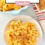 Overhead view of mac and cheese with bread crumb topping in a baking dish and on a plate.
