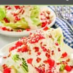 Maytag buttermilk blue cheese dressing on top of a wedge of iceberg lettuce.