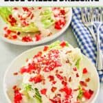 Maytag buttermilk blue cheese dressing on iceberg lettuce wedges and two forks.