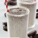 Two McDonald's oreo mcflurry treats in glasses.